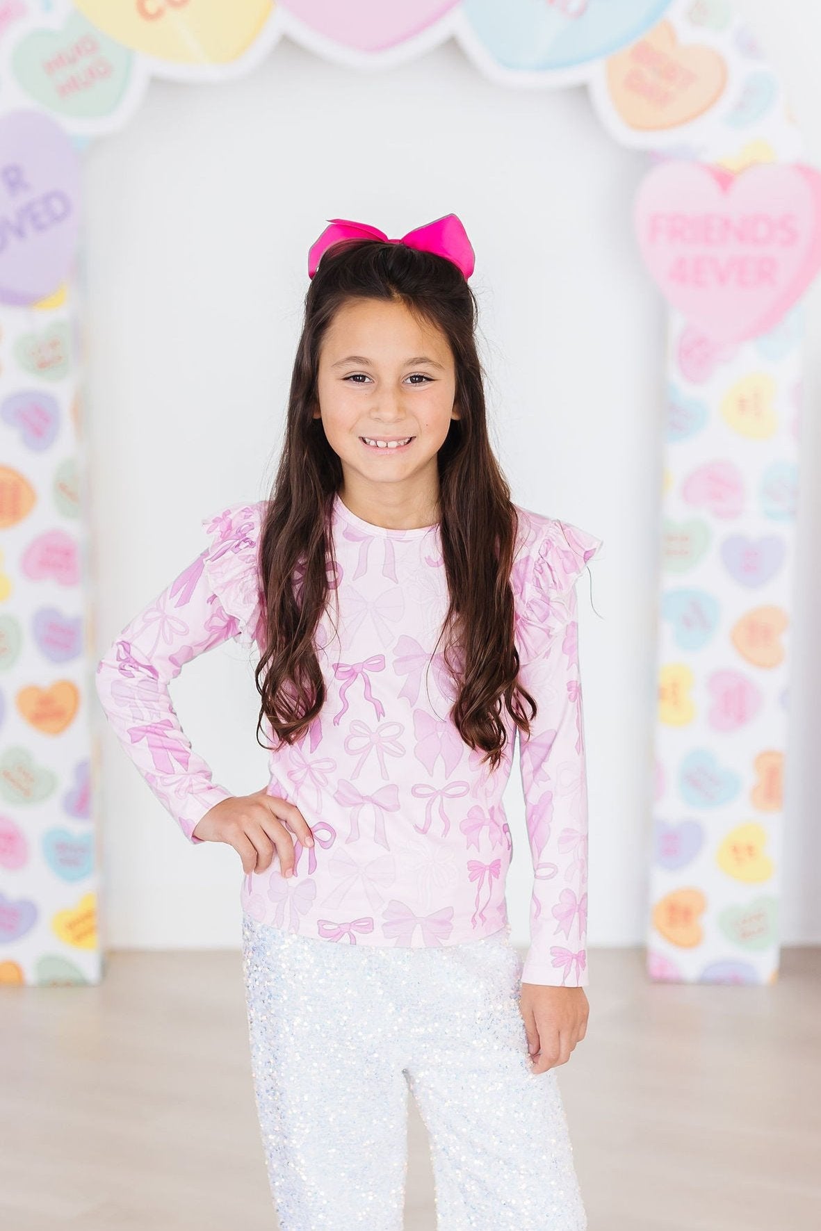 Mila & Rose ® Twinkle Ties L/S Ruffle Tee — back view