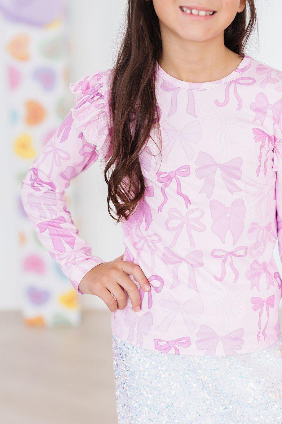 Mila & Rose ® Twinkle Ties L/S Ruffle Tee — lifestyle context