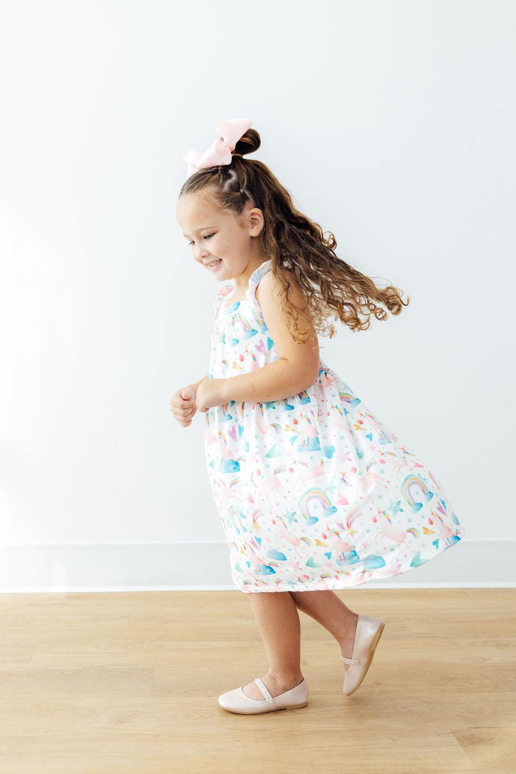 Mila & Rose ® Unicorn Kisses Ruffle Cross Back Dress — lifestyle context