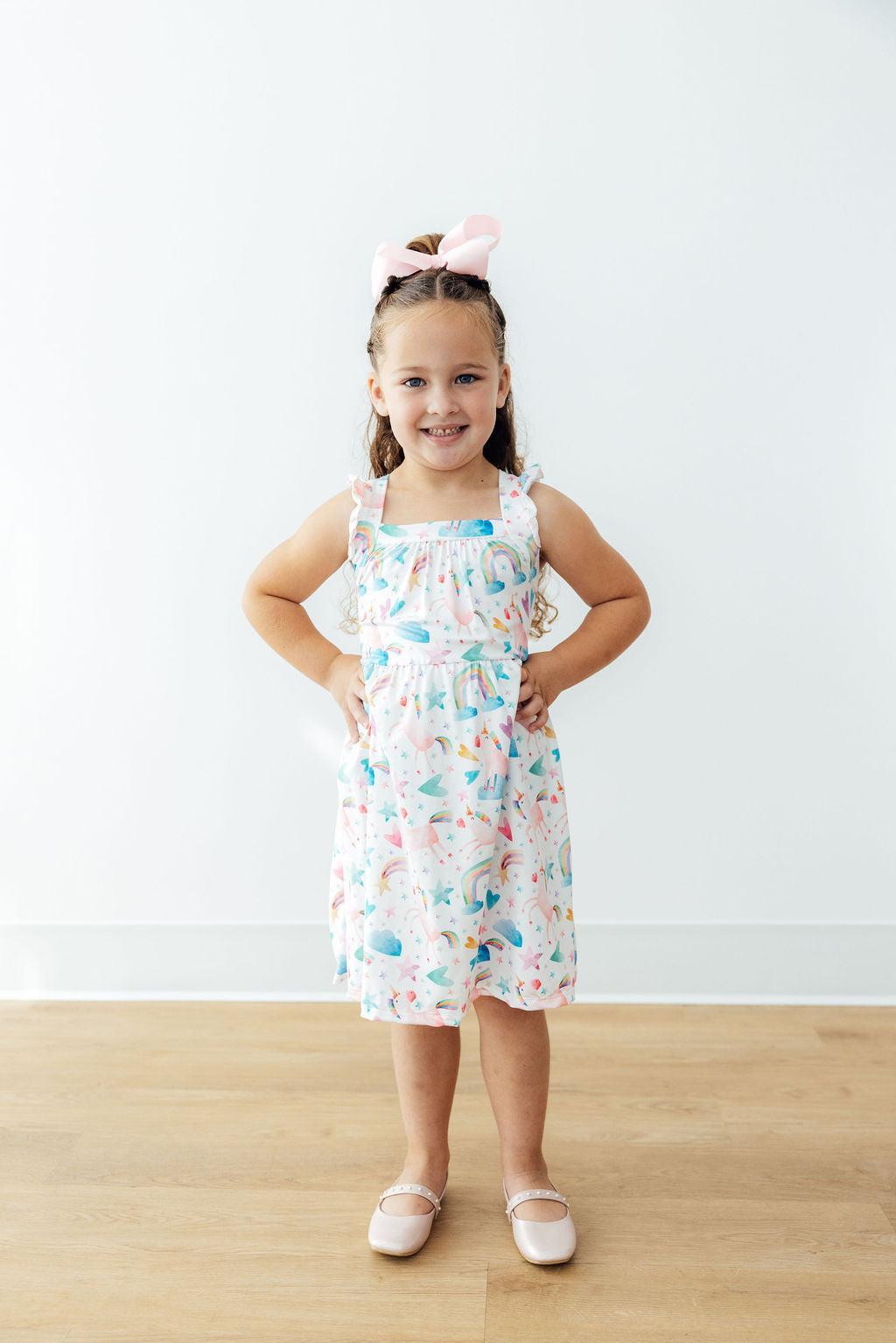 Mila & Rose ® Unicorn Kisses Ruffle Cross Back Dress — side view