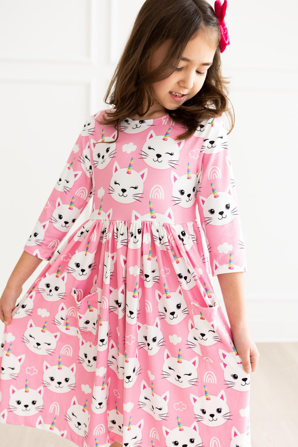 Mila & Rose ® Unicorn Kitties 3/4 Sleeve Pocket Twirl Dress — size reference