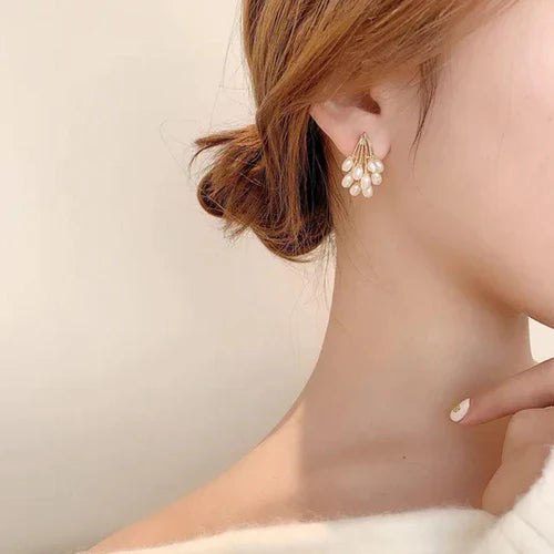 SORI STYLE Elegant Gold & Pearl Cluster Earrings — lifestyle context