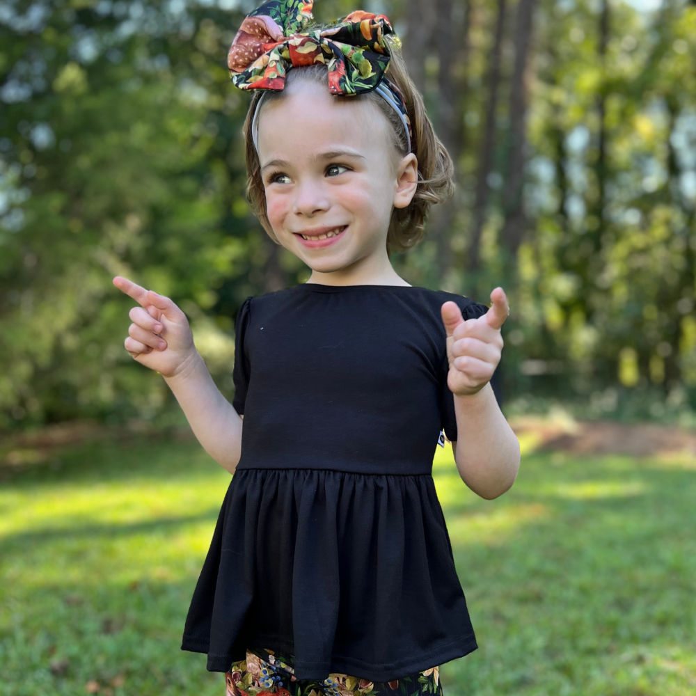 bumblitostore Bamboo Short Sleeve Peplum Top in Black — detail close-up
