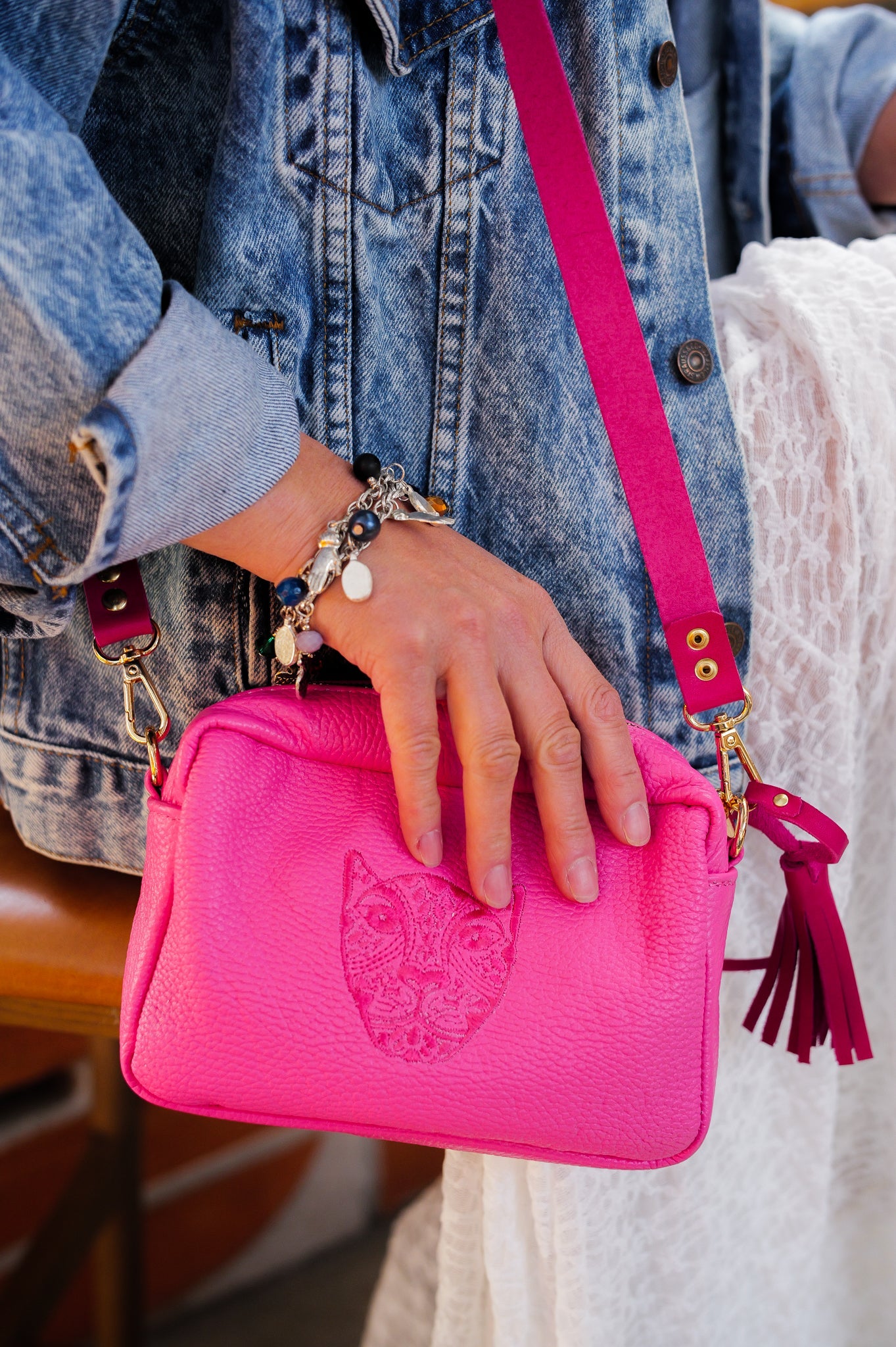 LOLA Y TULA Jaguar Lucia Crossbody Hot Pink — detail close-up