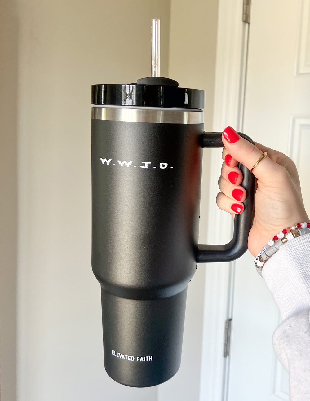 Elevated Faith WWJD 40 oz Tumbler — in-use photo