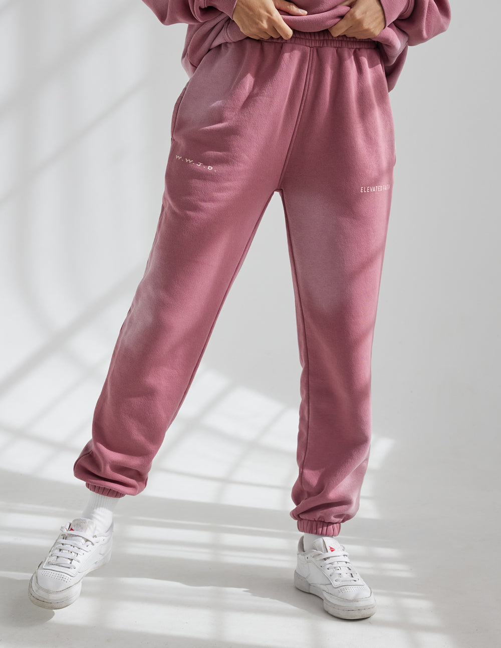 Elevated Faith WWJD Pink Unisex Sweatpant — Elevated Faith branding close-up