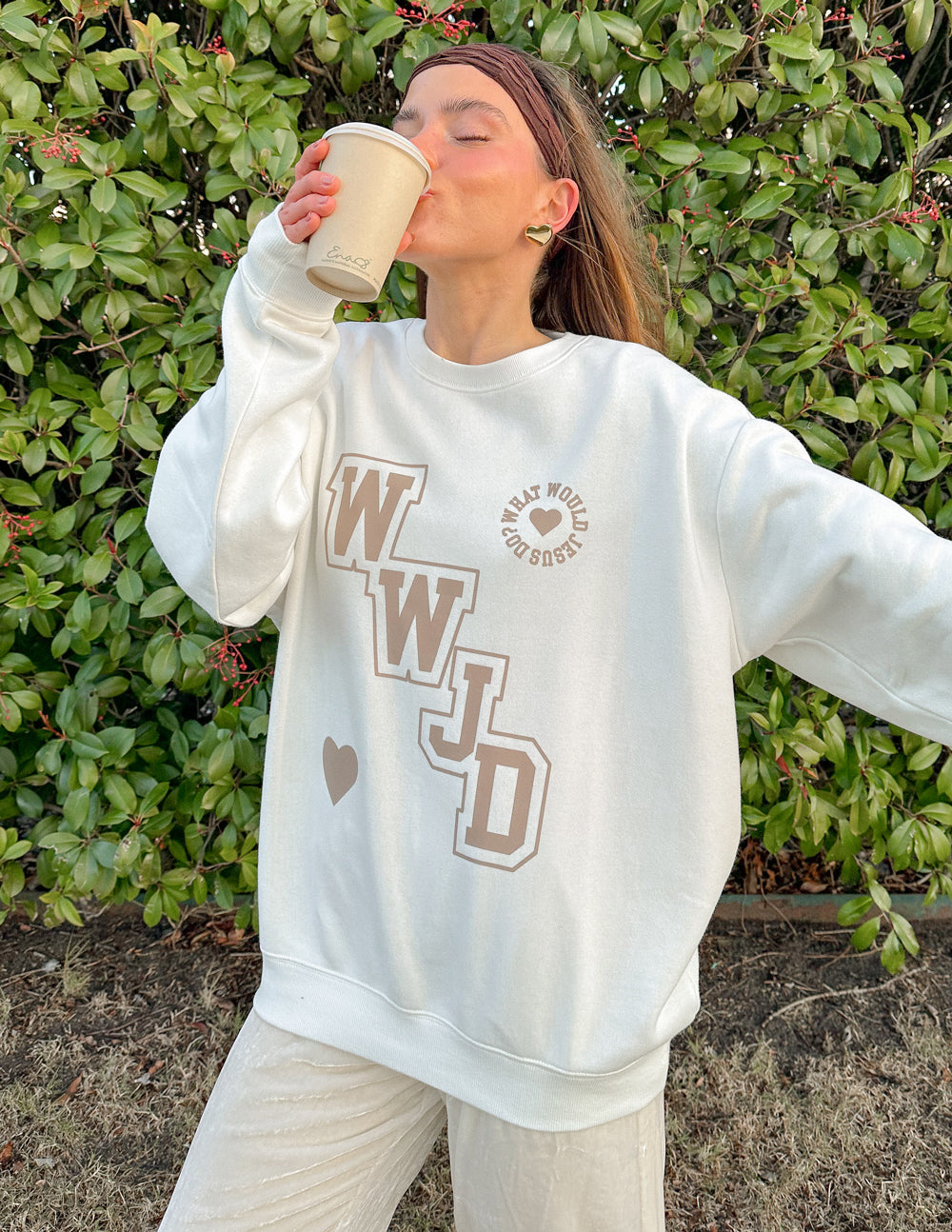 Elevated Faith WWJD Varsity Unisex Crewneck — lifestyle worn / used context