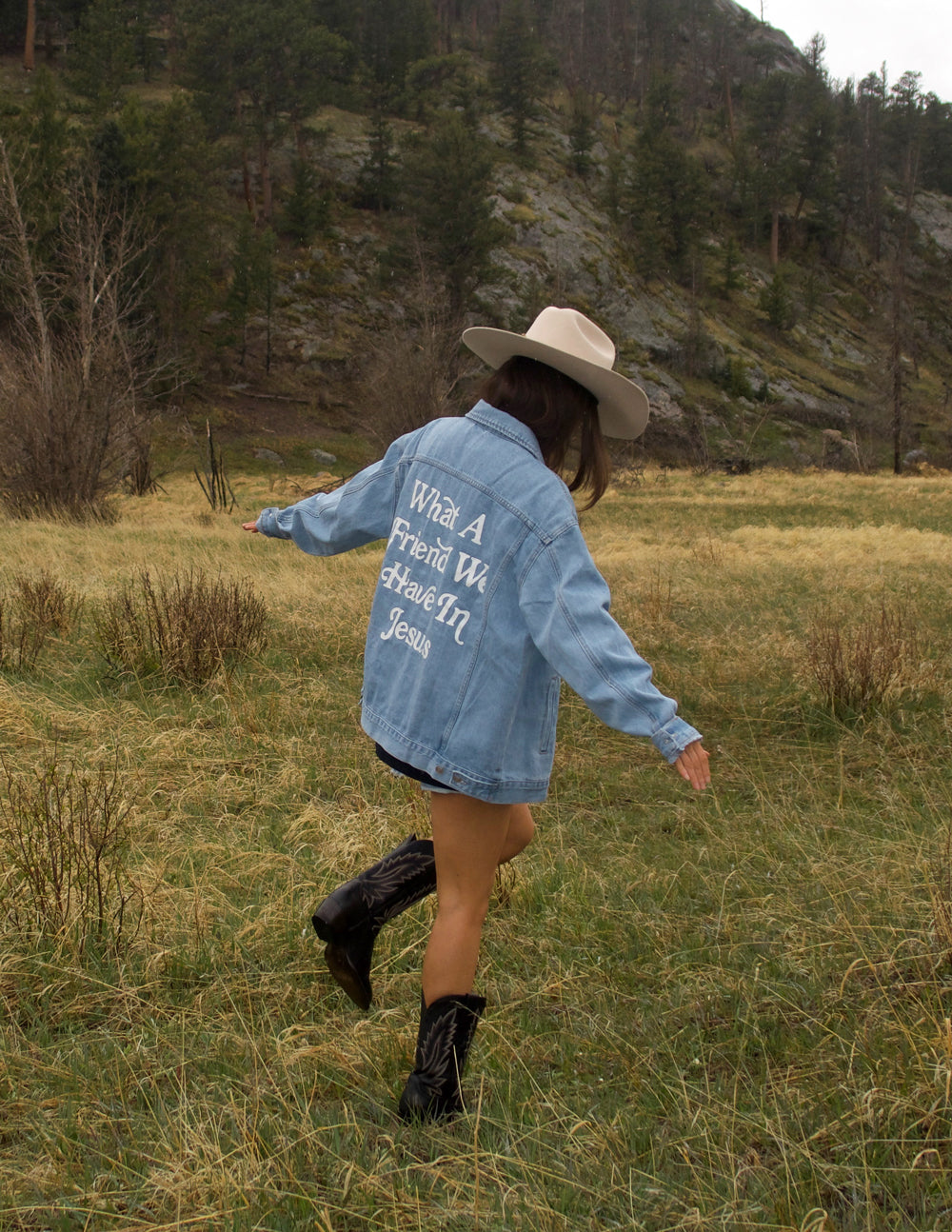 Elevated Faith What a Friend In Jesus Denim Jacket — in-use photo