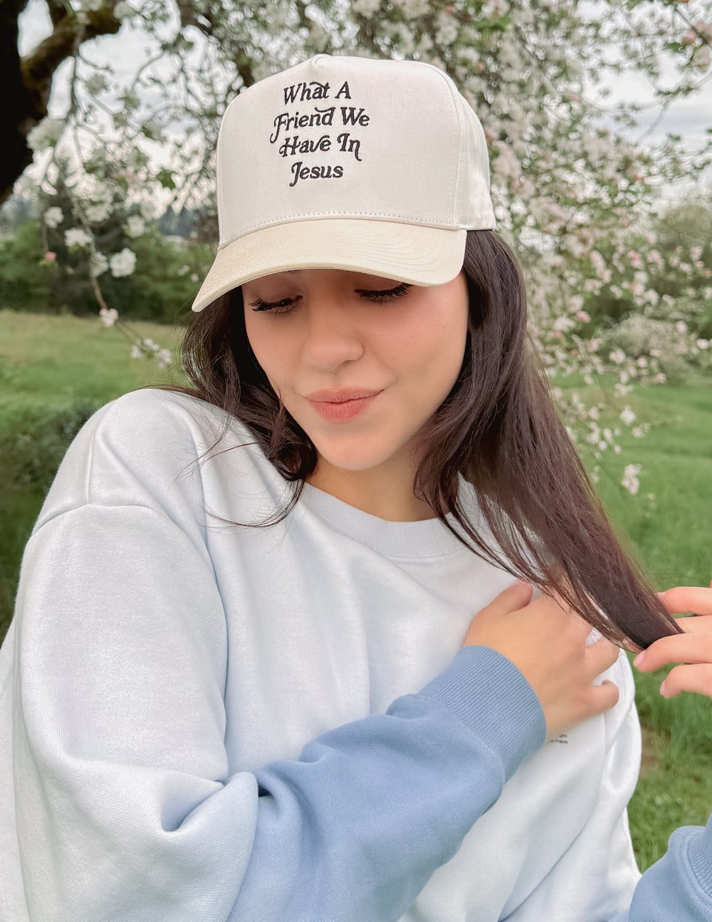 Elevated Faith What a Friend in Jesus Trucker Hat — lifestyle context