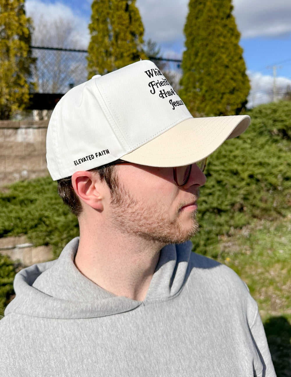 Elevated Faith What a Friend in Jesus Trucker Hat — comparison shot