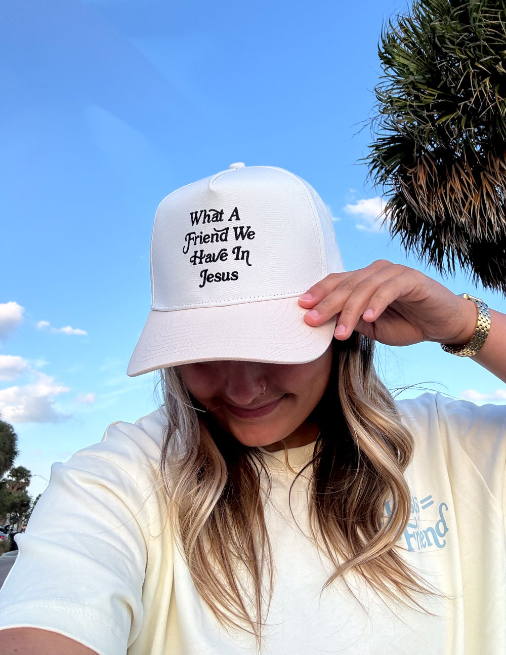Elevated Faith What a Friend in Jesus Trucker Hat — back view
