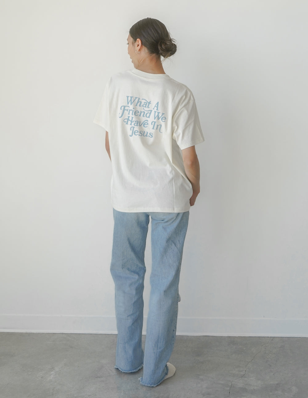 Elevated Faith What a Friend in Jesus Unisex Tee — lifestyle context