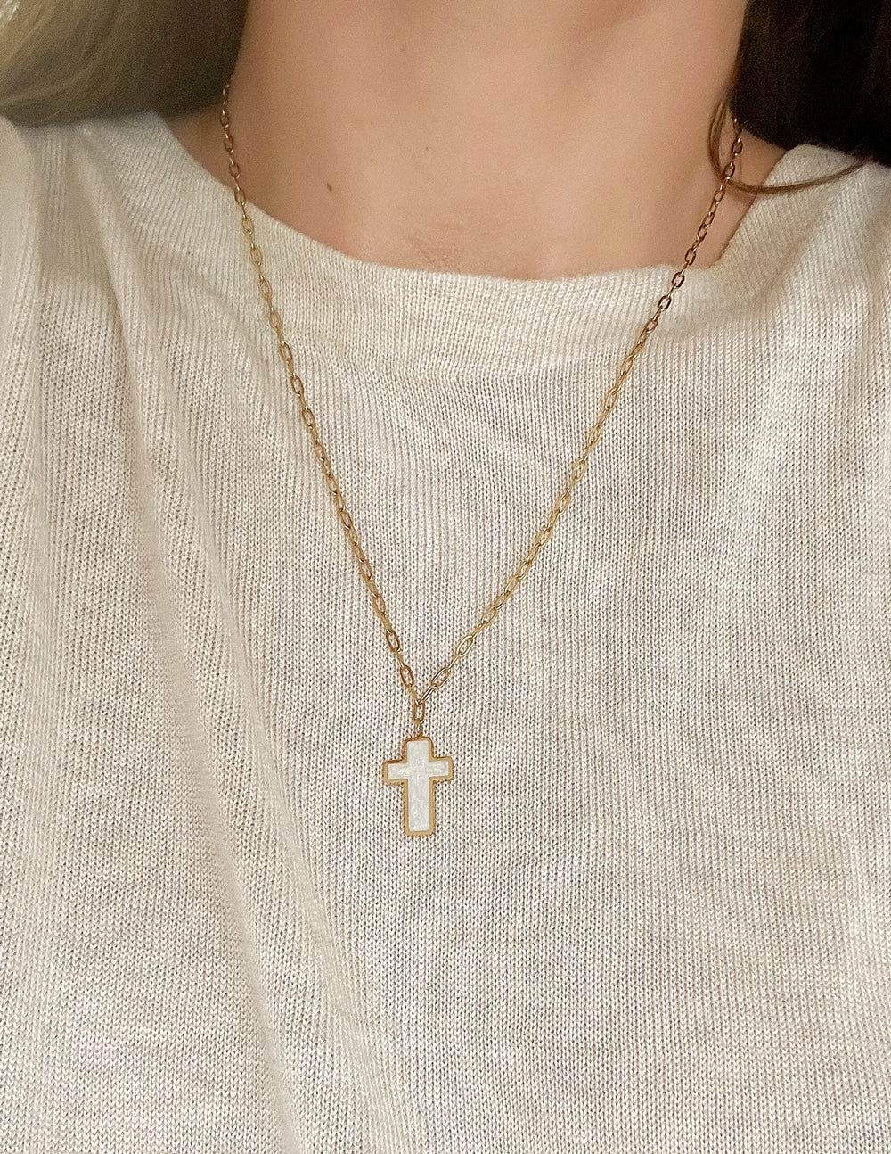 Elevated Faith White Enamel Cross Necklace — lifestyle worn / used context
