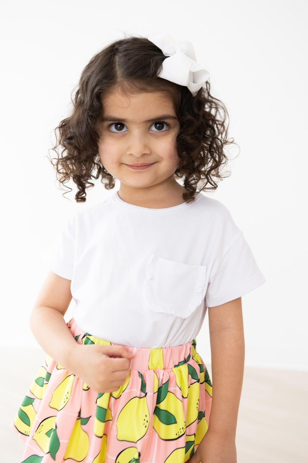 Mila & Rose ® White Ruffle Pocket Tee — alternative angle