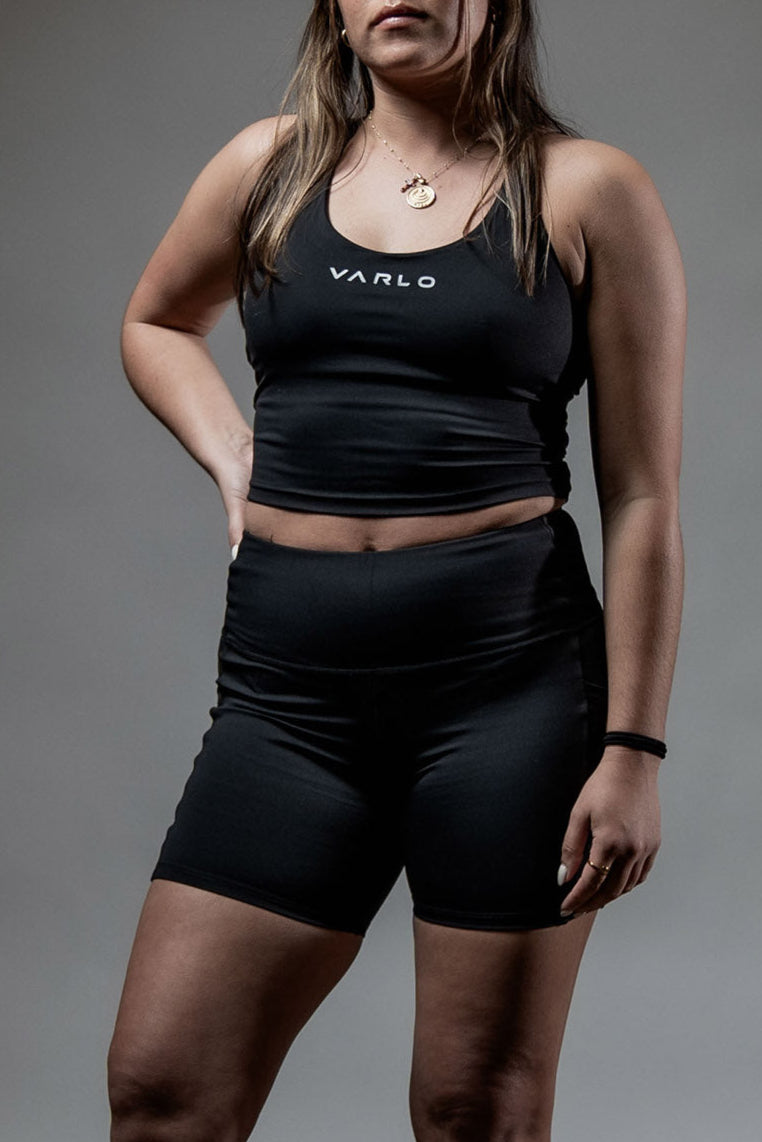 Varlo Women's SOHO Fitness Shorts 5" (Black) — Varlo branding close-up