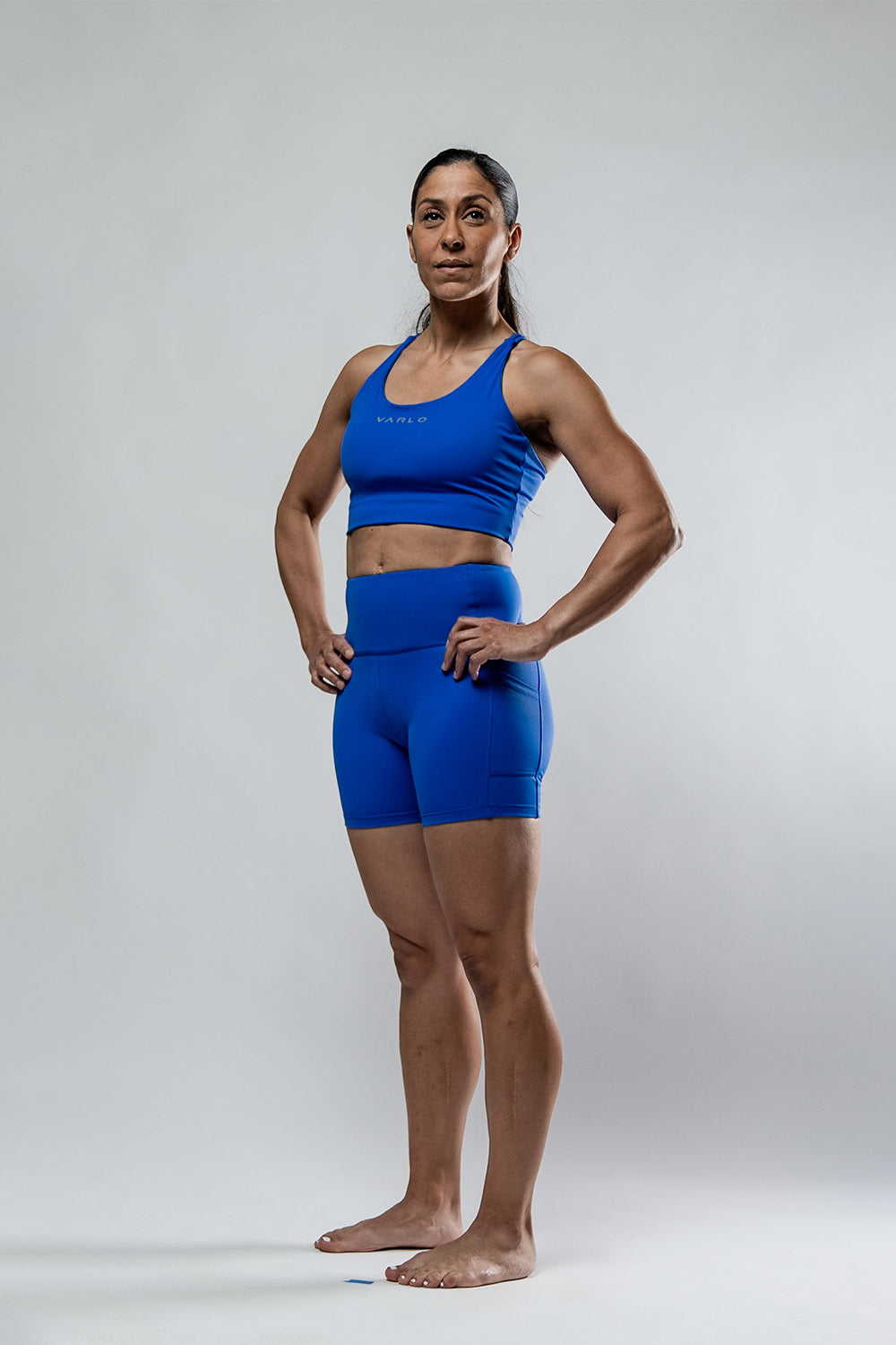 Varlo Women's SOHO Fitness Shorts 5" (Neo Blue) — lifestyle context