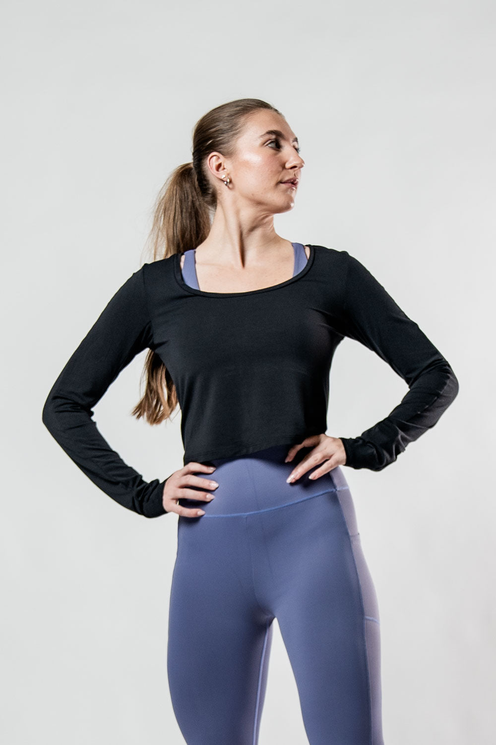 Varlo Women's Terra Recovery Arc Long Sleeve Crop (Black) — lifestyle worn / used context