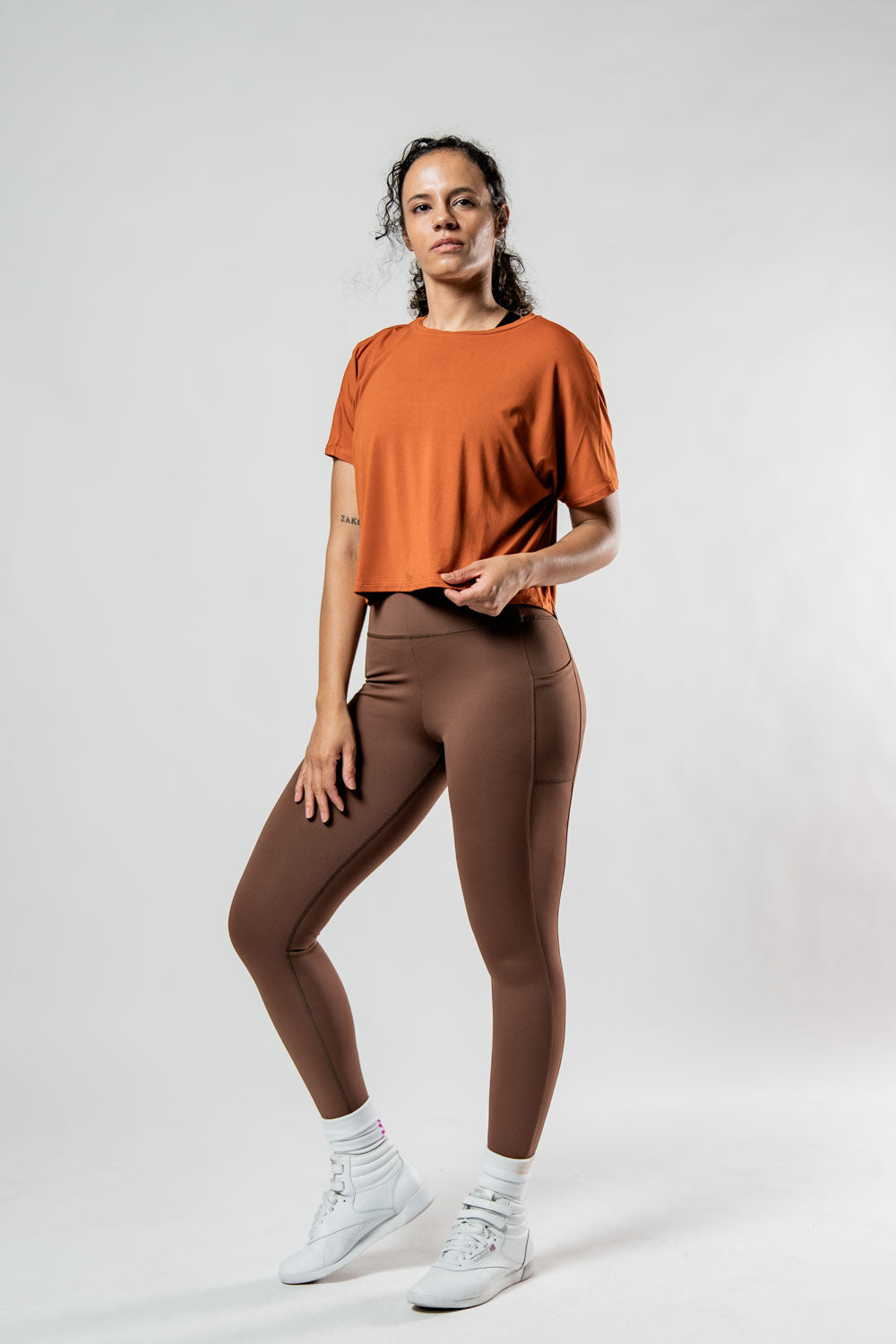 Varlo Women's Terra Recovery Drift Crop (Sunfire Clay) — lifestyle worn / used context