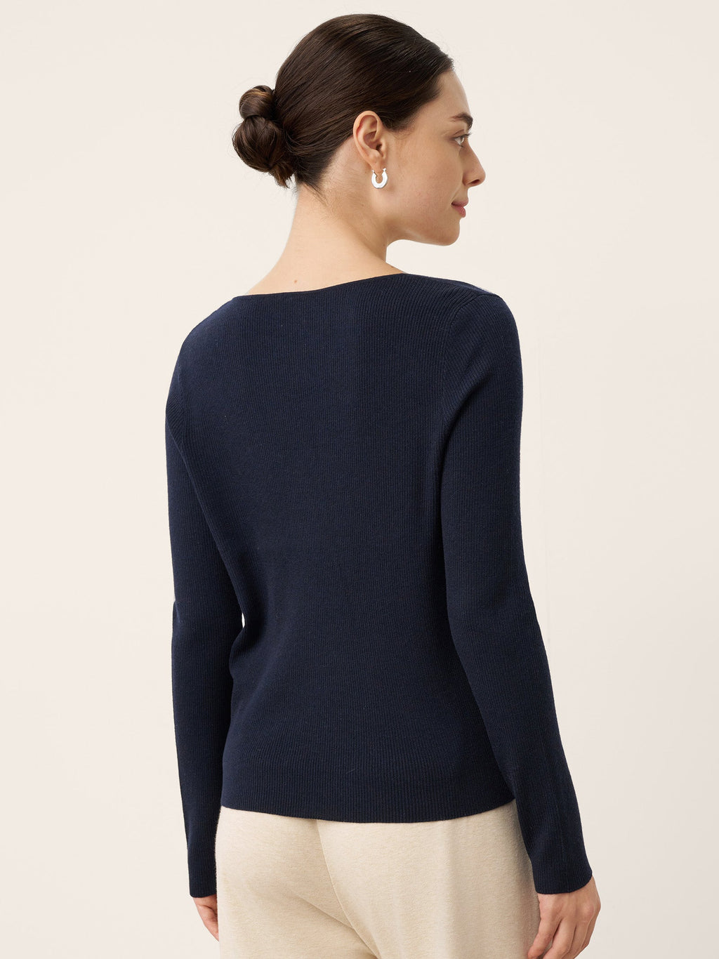 LINTICO Merino Wool Knot Detail Asymmetric Cutout Top QUINNLEY — construction detail