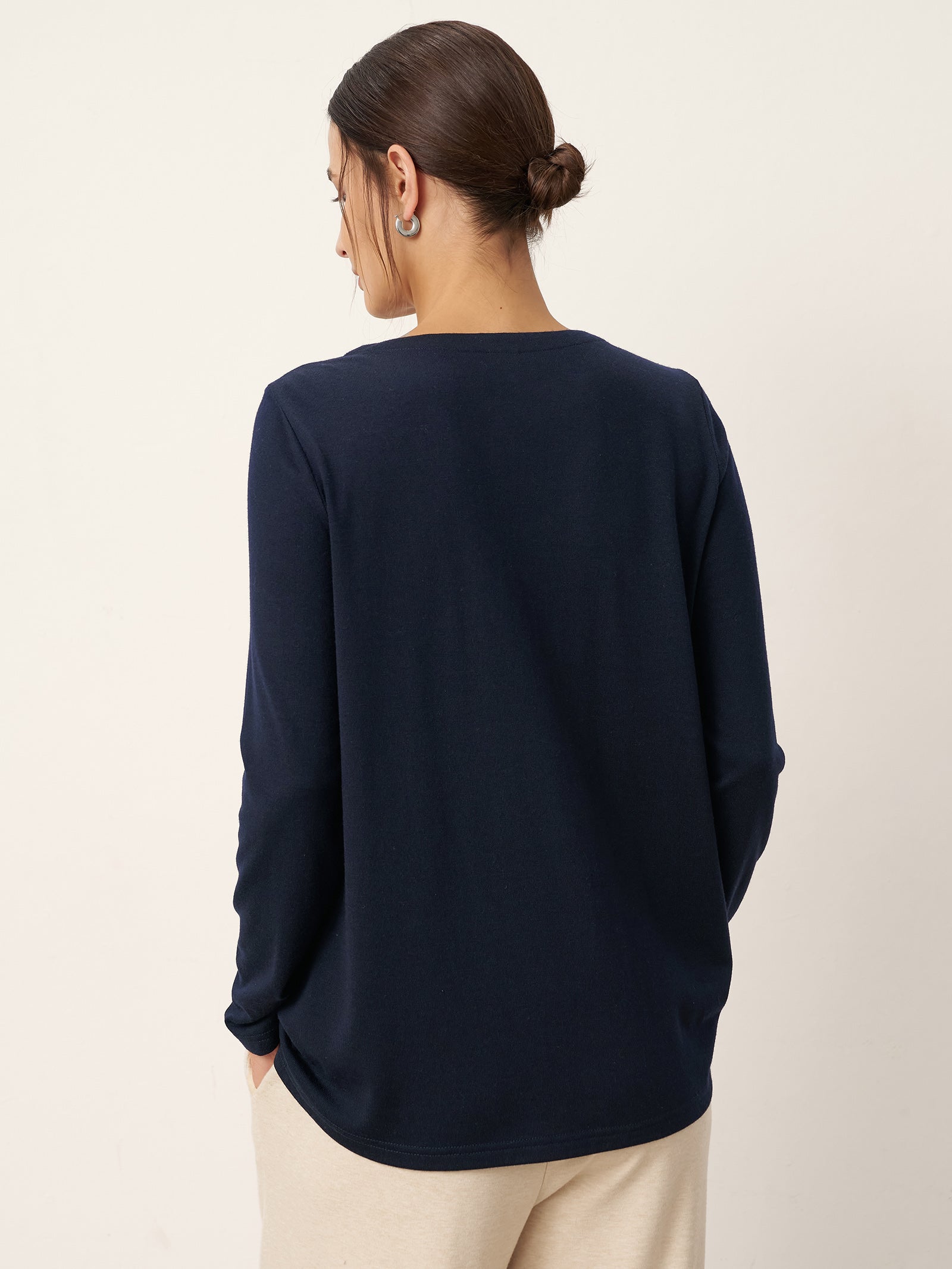 LINTICO LINTICO Wool Pleated Front Long Sleeve Top IVA — LINTICO branding close-up