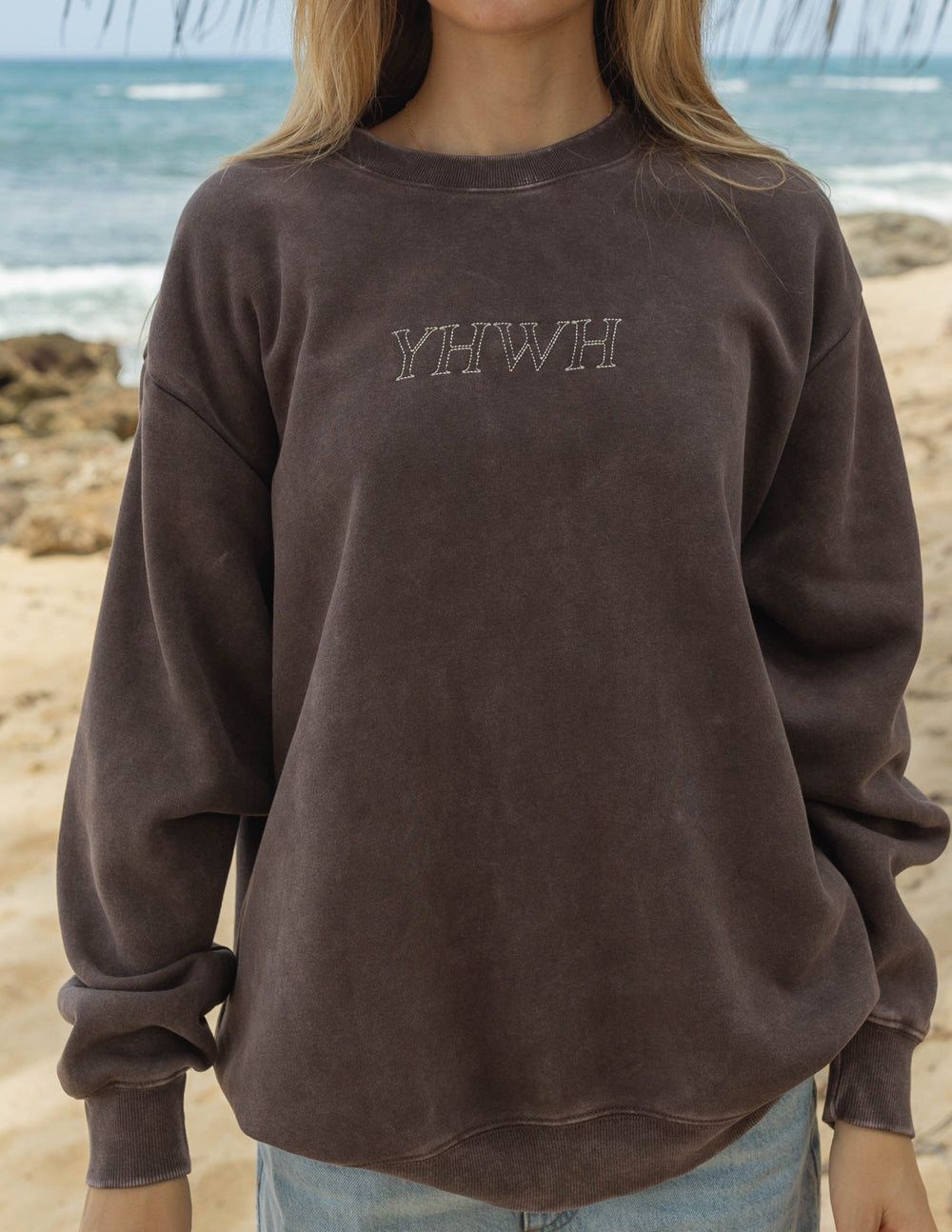 Elevated Faith YHWH Unisex Crewneck — Elevated Faith branding close-up