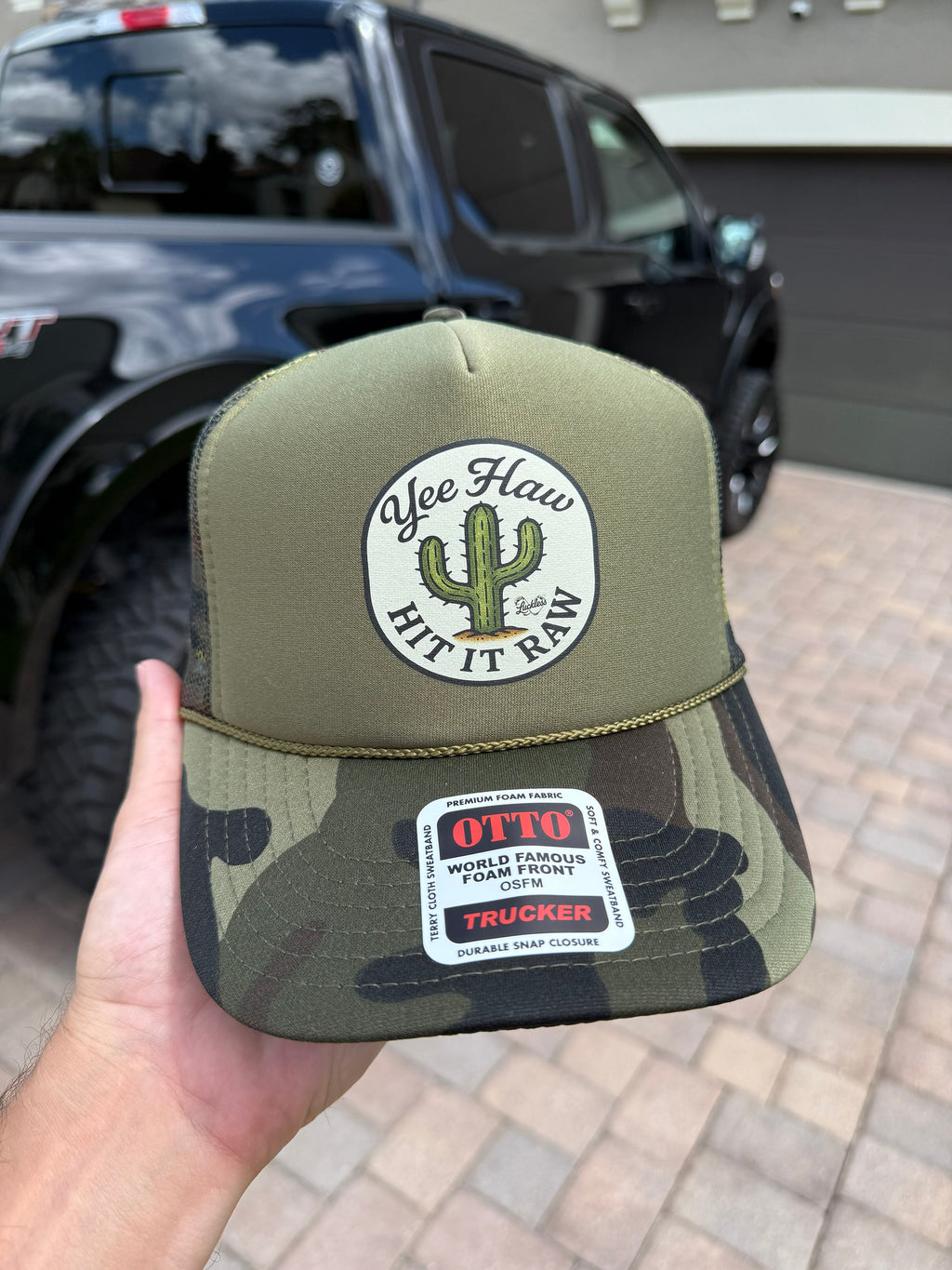 Luckless Outfitters Yee Haw Hit it Raw Camo Trucker — back view