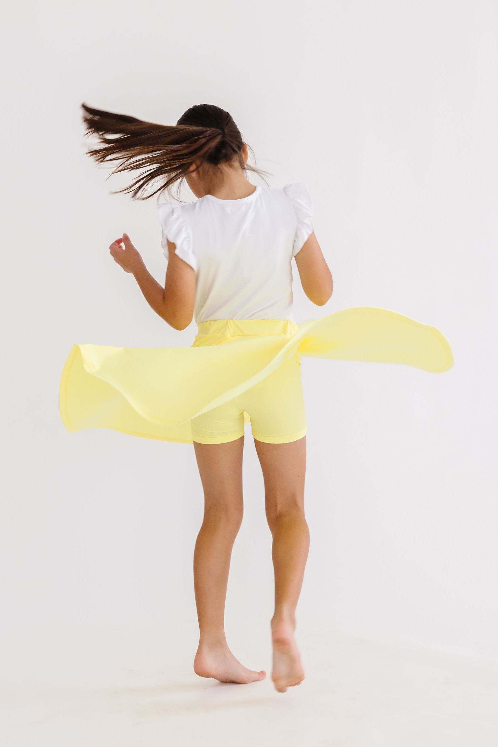 Mila & Rose ® Yellow Twirl Skort — lifestyle context
