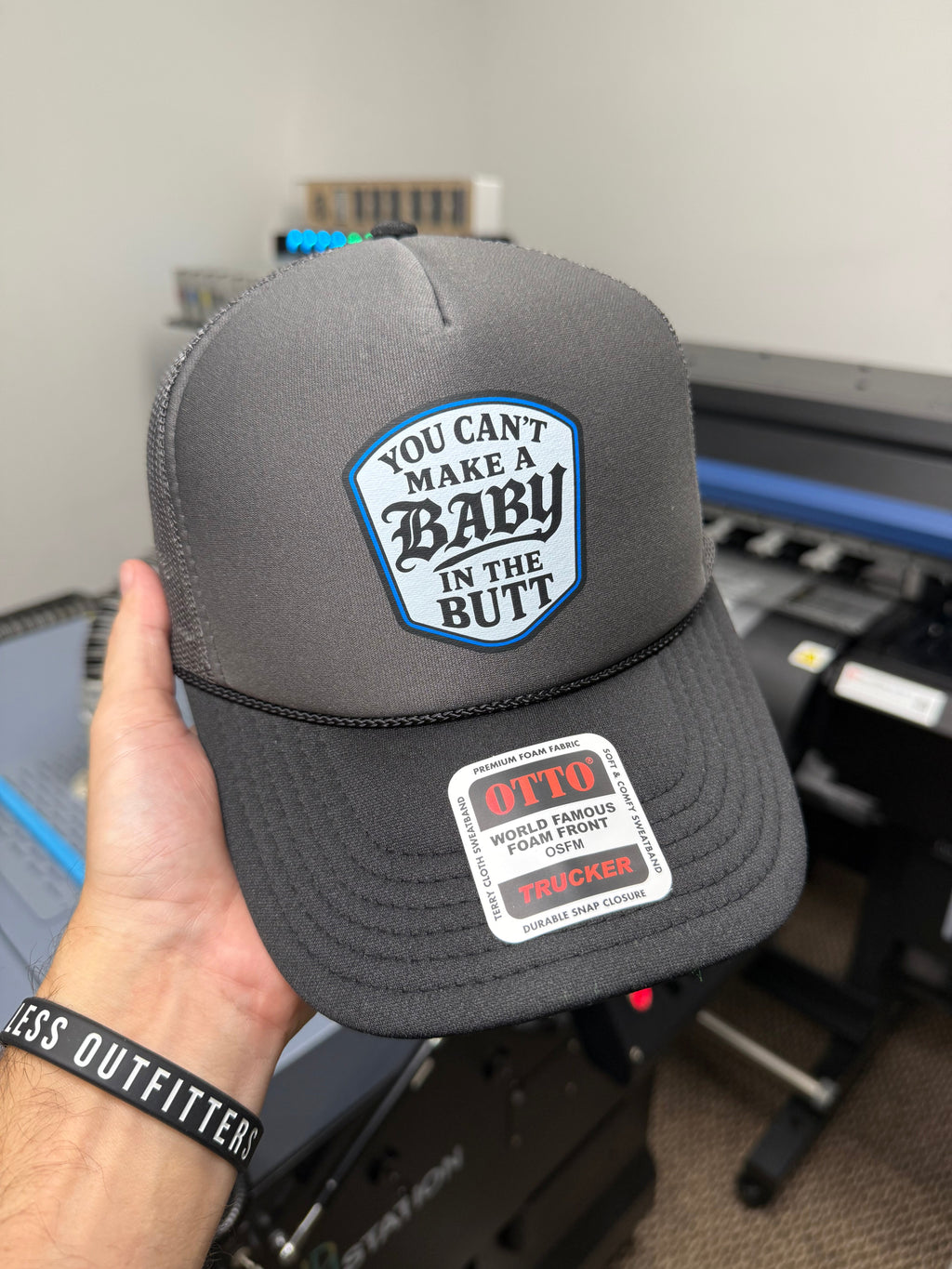 Luckless Outfitters You Cant Make A Baby In The Butt Trucker Hat — back view