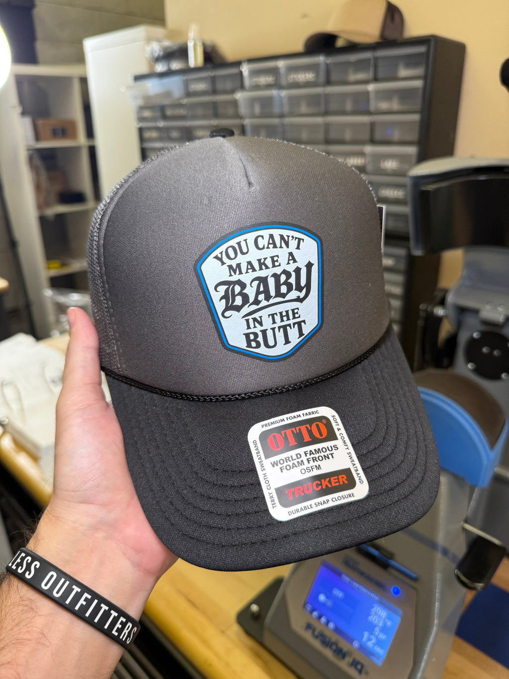 Luckless Outfitters You Cant Make A Baby In The Butt Trucker Hat — in-use photo