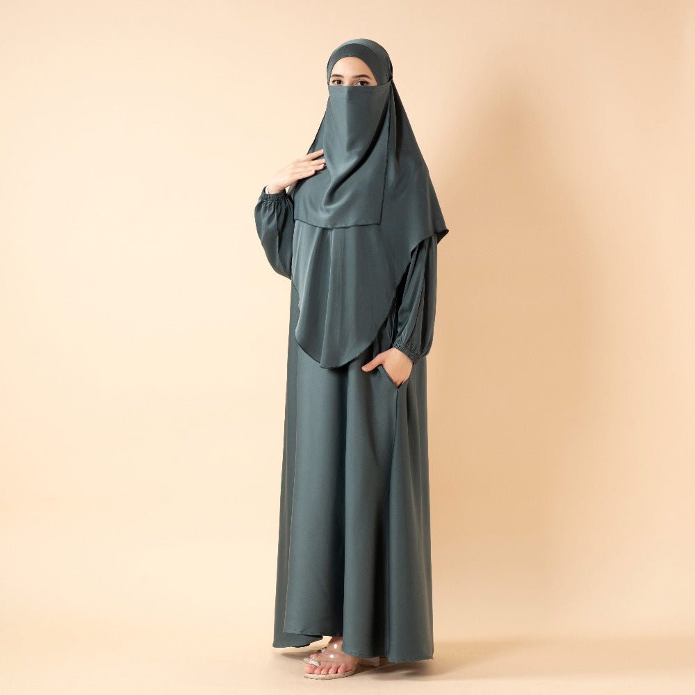Mariam's Collection Abaya With Niqab and Khimar | Satin Niqab Khimar and Abaya (MK024) — Mariam's Collection branding close-up