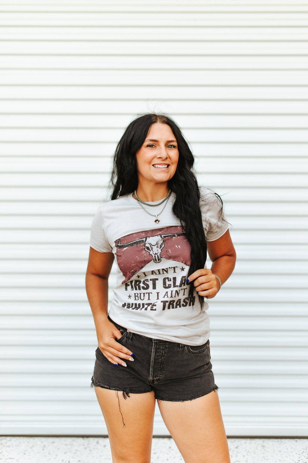 Wild Junkie Ain't First Class Graphic Tee — Wild Junkie branding close-up