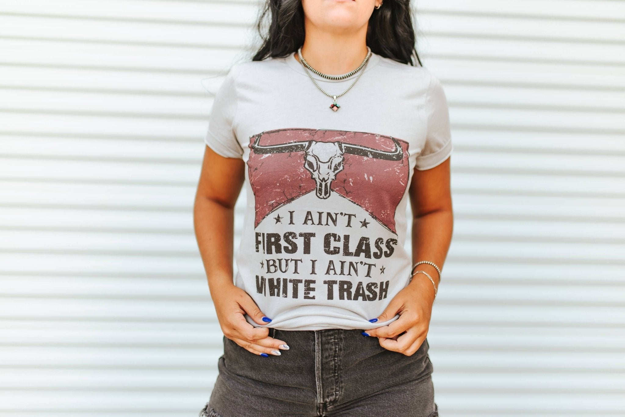 Wild Junkie Ain't First Class Graphic Tee — graphic tees category context