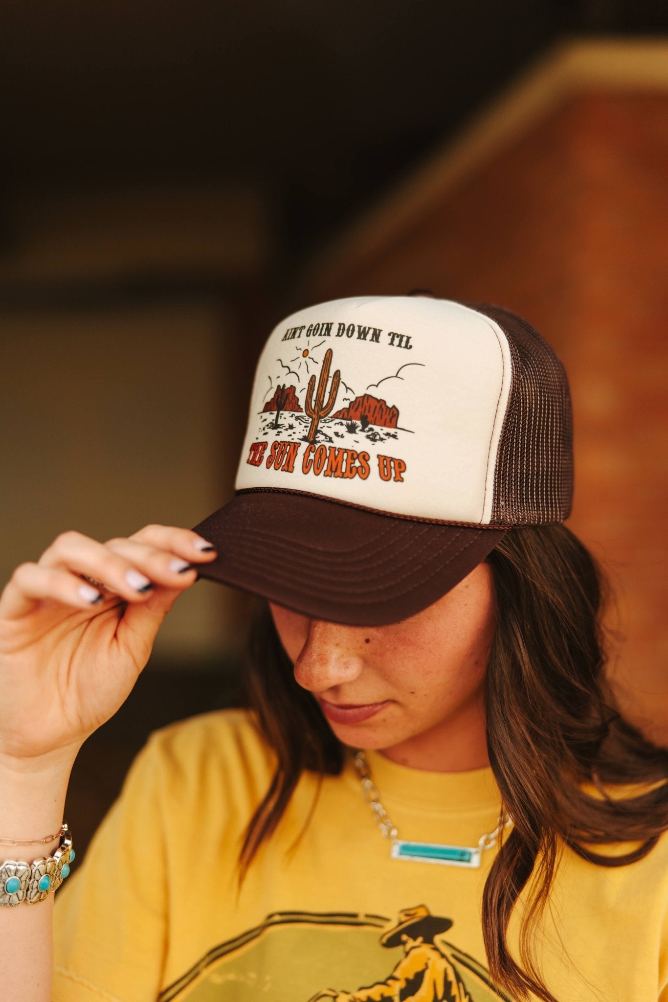 Wild Junkie Ain't Going Down Trucker Hat — lifestyle context