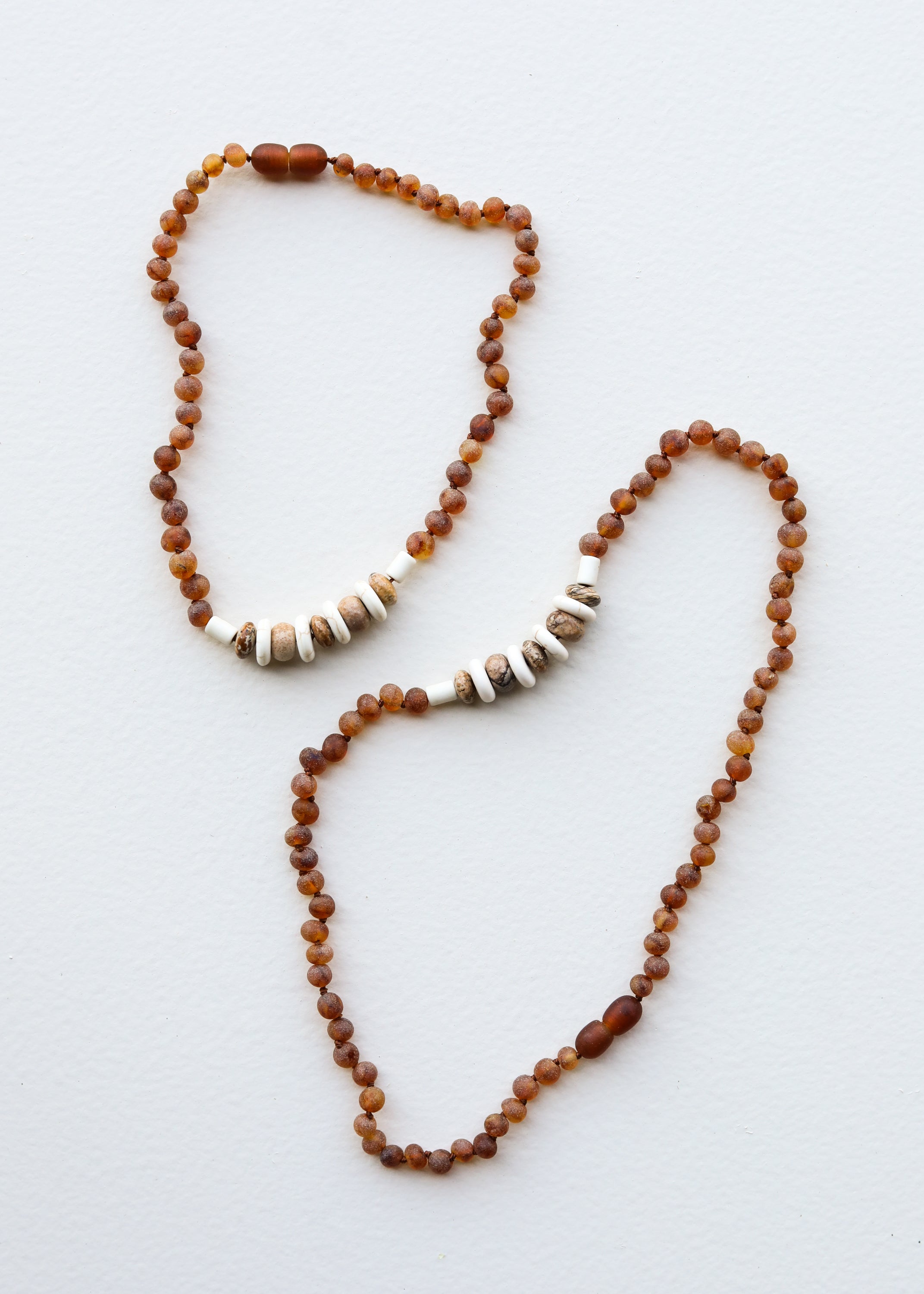 CanyonLeaf Raw Cognac Baltic Sea Amber + Natural Jasper || Necklace — CanyonLeaf branding close-up