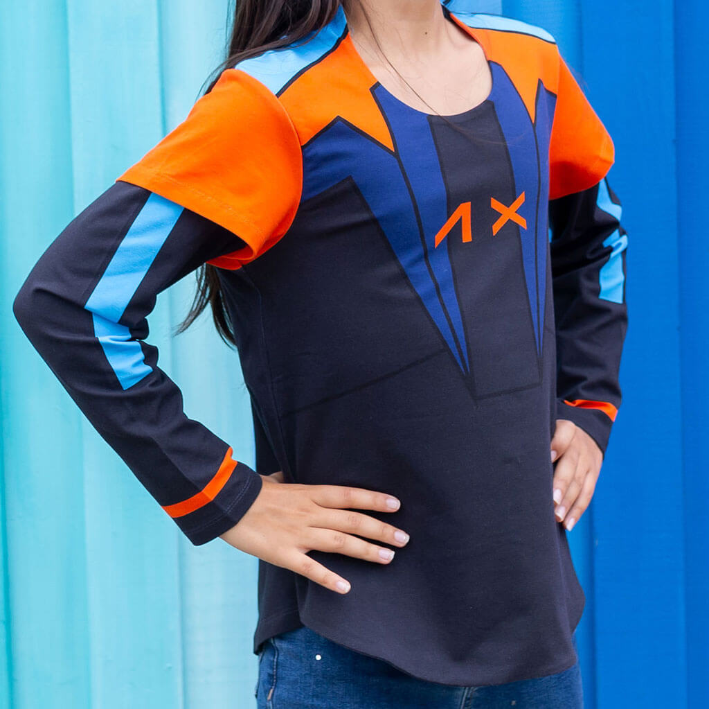 Princess Awesome & Boy Wonder Artemis Astronaut Double Sleeve Tunic Shirt — Princess Awesome & Boy Wonder branding close-up