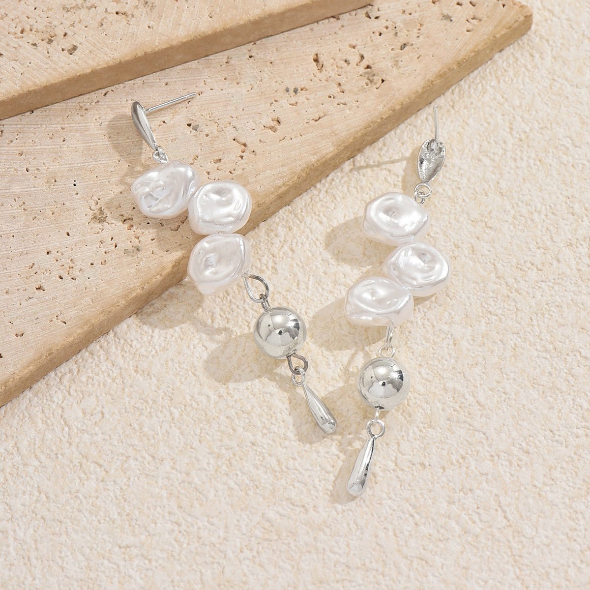 Mariam's Collection Artistic Asymmetric Pearl Drop Earrings (MAC325) — Mariam's Collection branding close-up