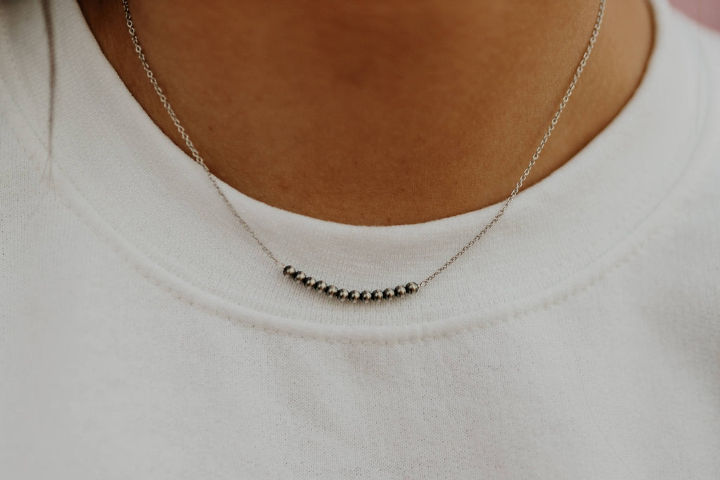 Wild Junkie Authentic Silver Pearl Bar Necklace — lifestyle context