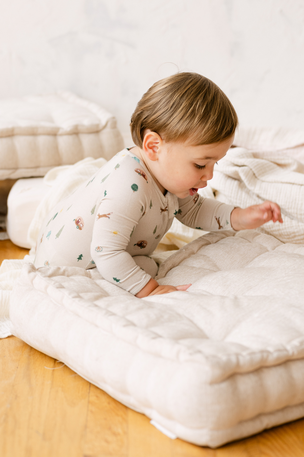 Dear Hayden Modal Convertible Footy Pajamas in Camping — lifestyle context