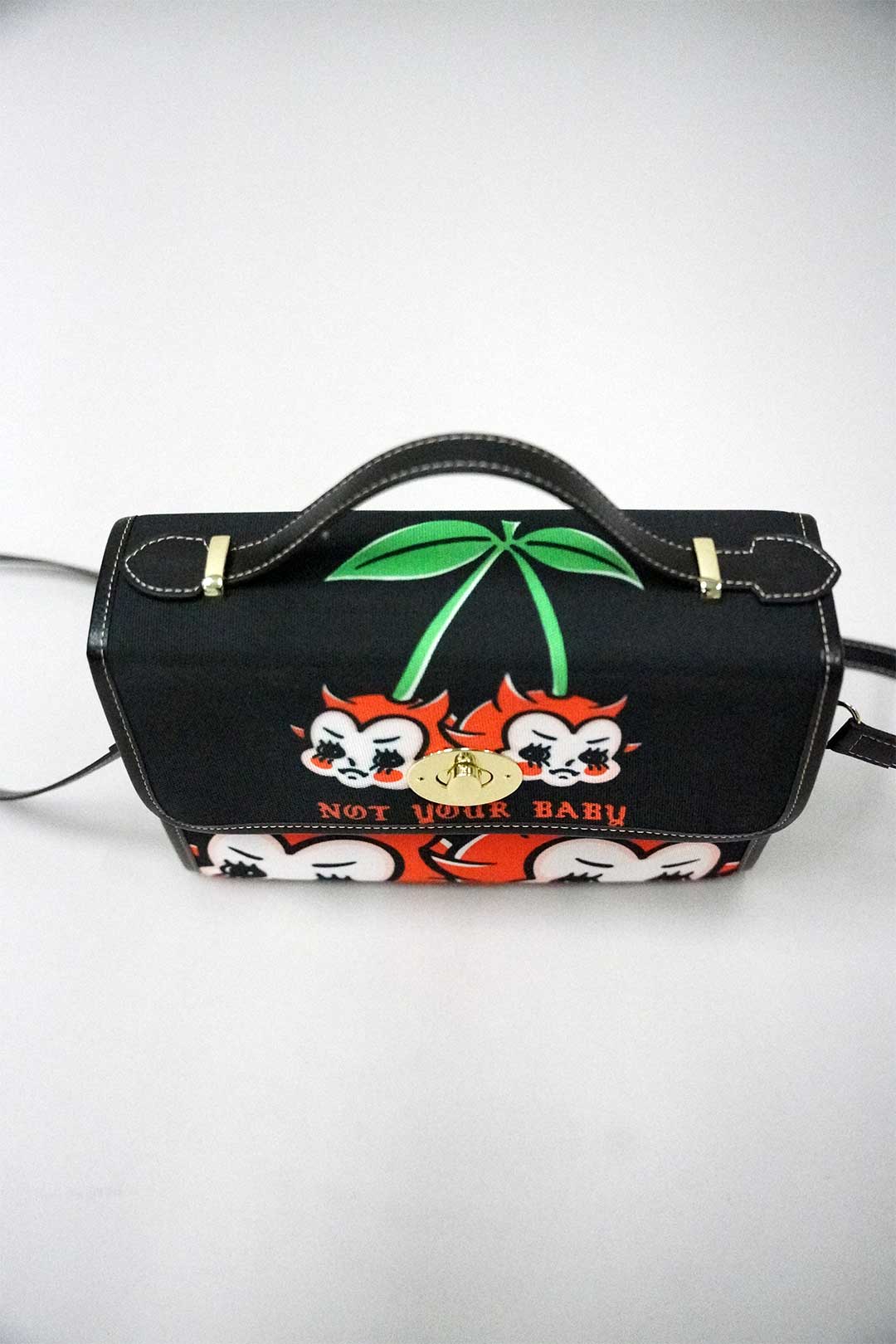 Thrash Happy Not Your Baby Purse — side view
