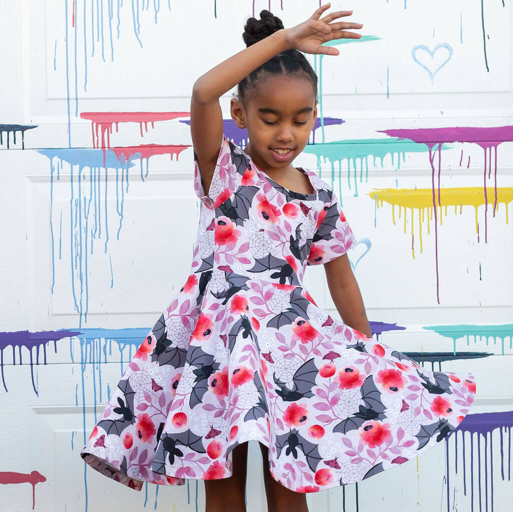 Princess Awesome & Boy Wonder Bats Super Twirler Dress with Pockets — lifestyle worn / used context