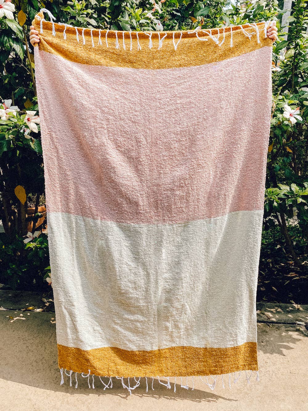 WONENA Sundream Sunrise - Sustainable Recycled Throw Blanket — WONENA branding close-up