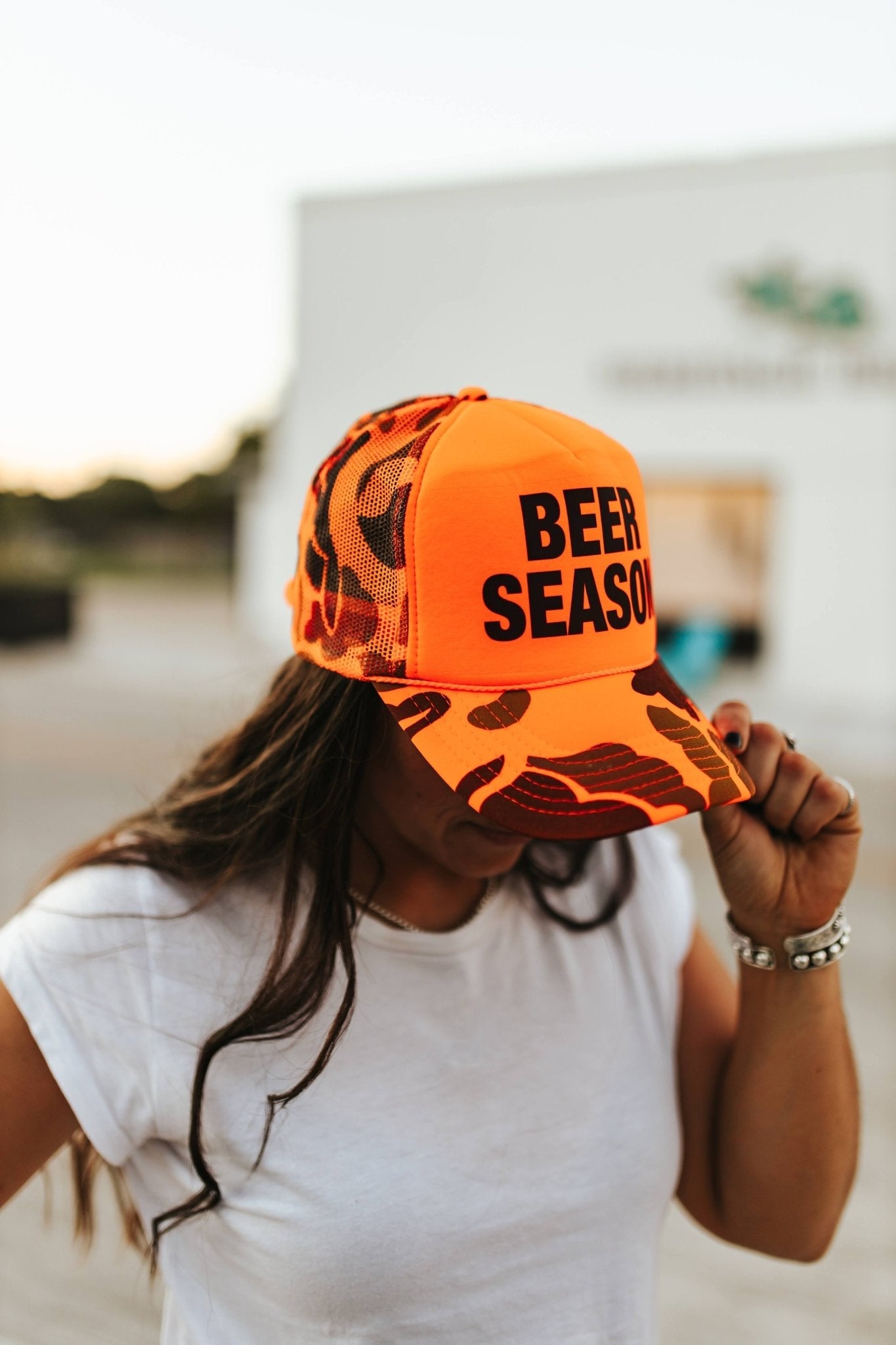 Wild Junkie Beer Season Trucker Hat — lifestyle context