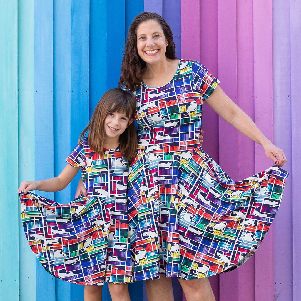 Princess Awesome & Boy Wonder "Check Meowt" Rainbow Books & Cats Super Twirler Dress with Pockets — lifestyle worn / used context