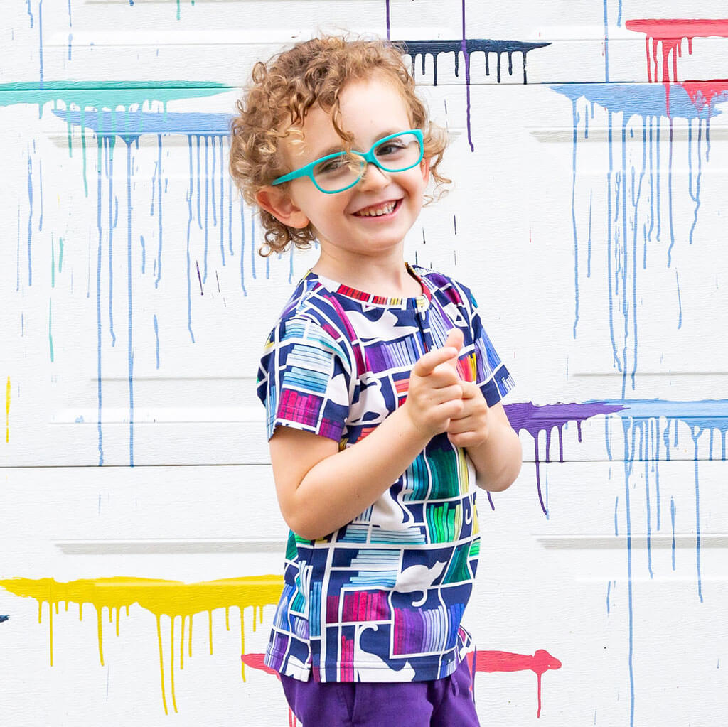 Princess Awesome & Boy Wonder "Check Meowt" Rainbow Books & Cats Henley Short Sleeve Tee — shirts category context