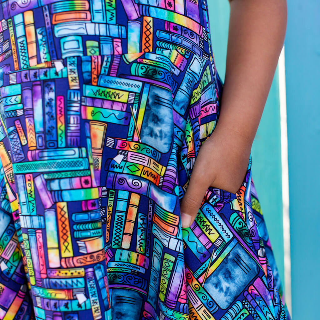 Princess Awesome & Boy Wonder "Lost in the Stacks" Books Sleeveless Play Dress with Pockets — lifestyle worn / used context