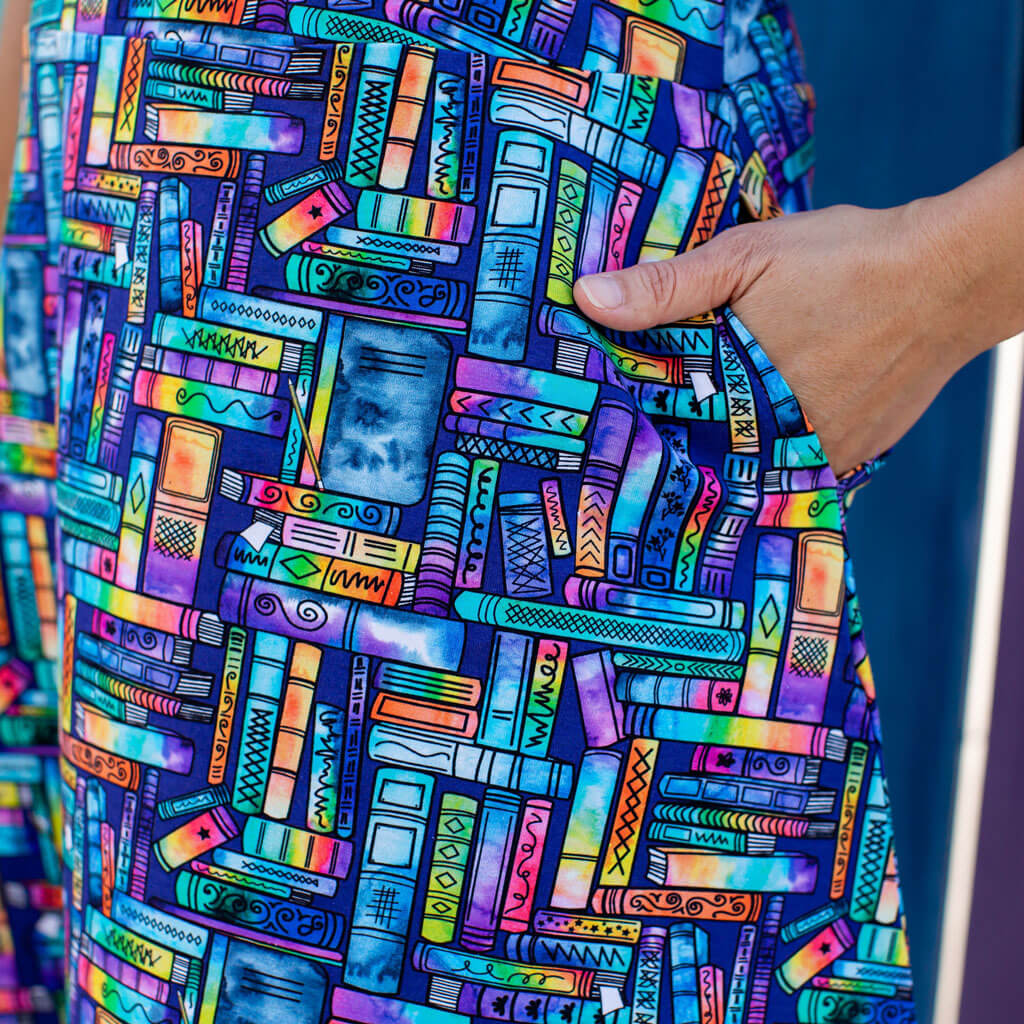 Princess Awesome & Boy Wonder "Lost in the Stacks" Adult Books Sleeveless Dress with Pockets — lifestyle worn / used context