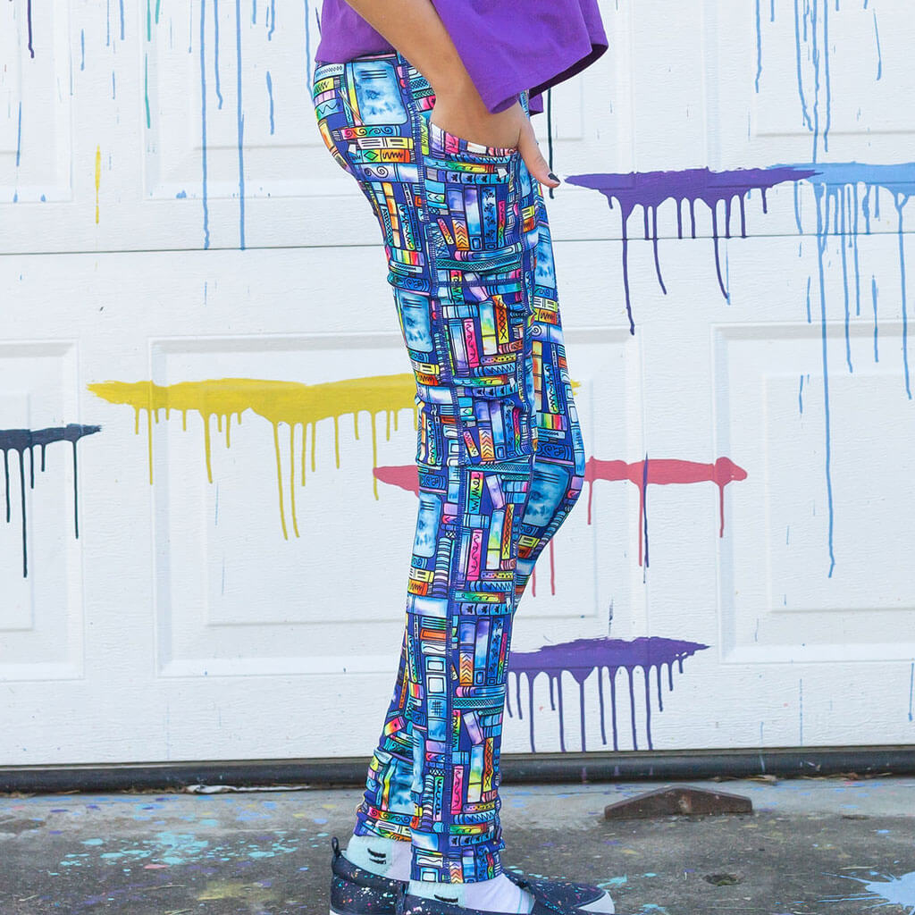 Princess Awesome & Boy Wonder "Lost in the Stacks" Books Leggings with Pockets — Princess Awesome & Boy Wonder branding close-up