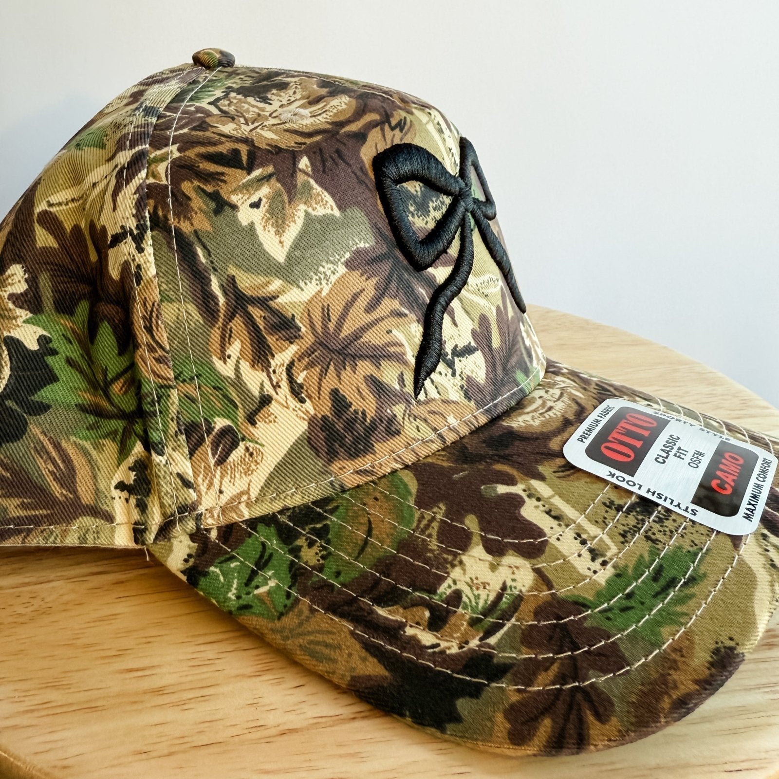 Coco & Rho Bow Camo- Trucker Hat Black — detail close-up