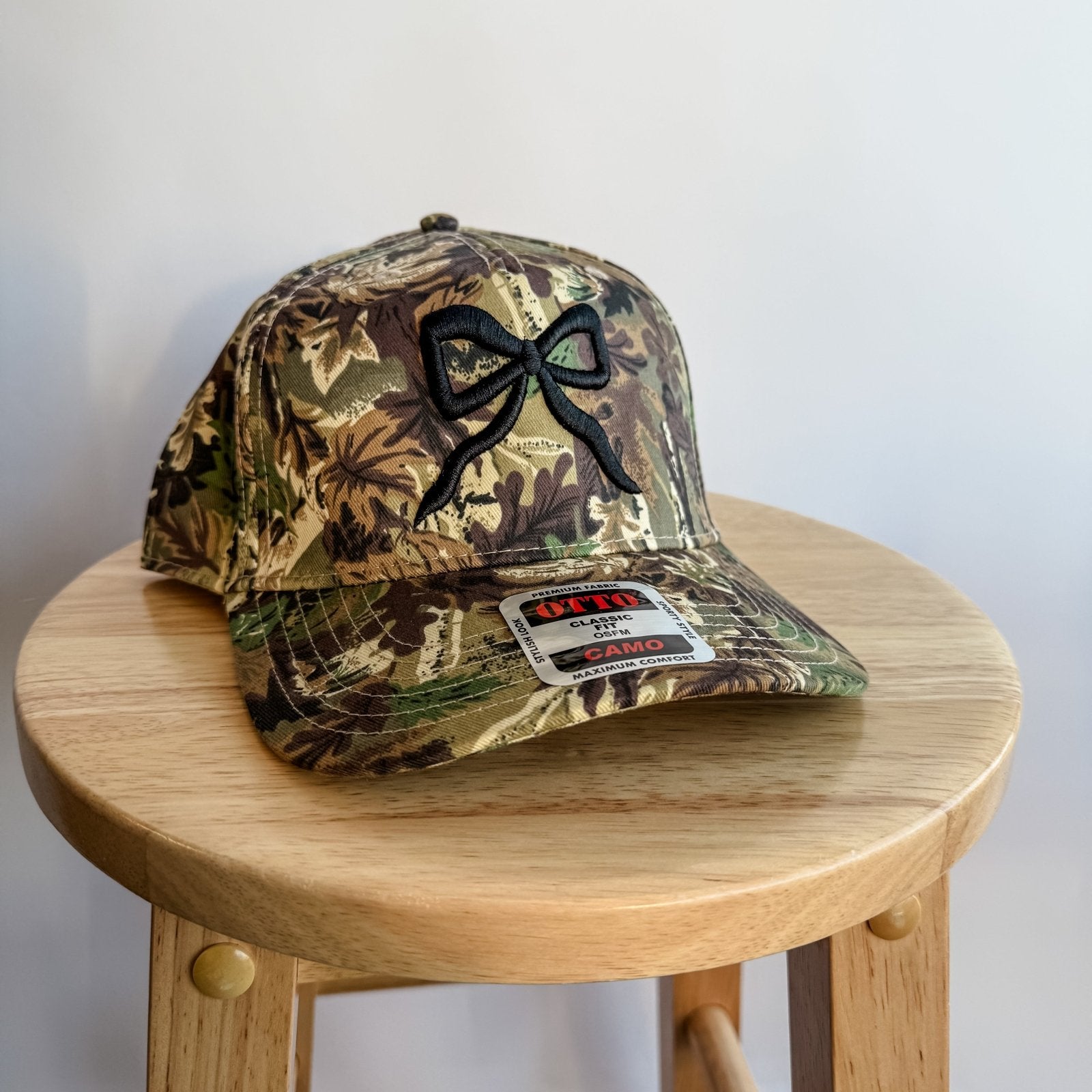 Coco & Rho Bow Camo- Trucker Hat Black — lifestyle context
