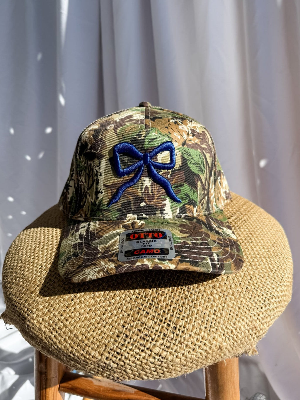 Coco & Rho Bow Camo- Trucker Hat Royal Blue — main product shot